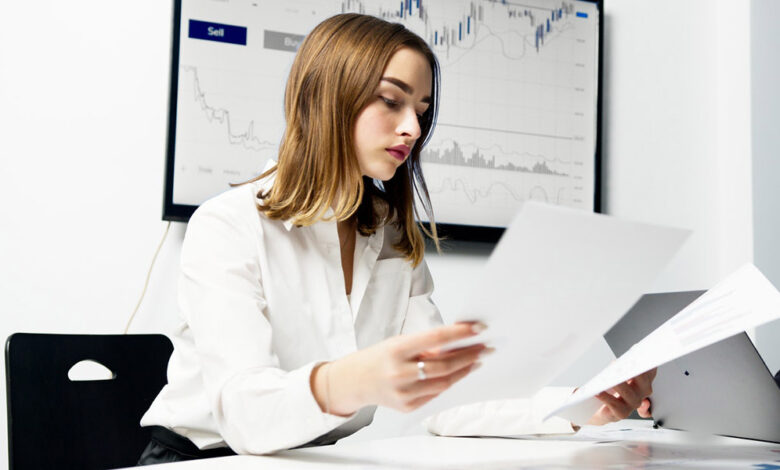 woman reading a report