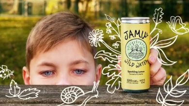 child holding a Jamu drink can