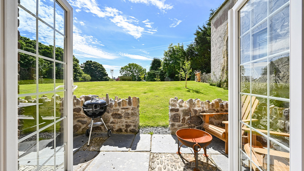 the patio area of a Tremaine Manor Cottage