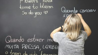child looking at a blackboard learning a language