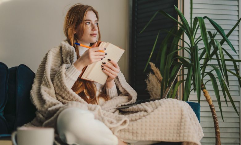 Woman writing a journal